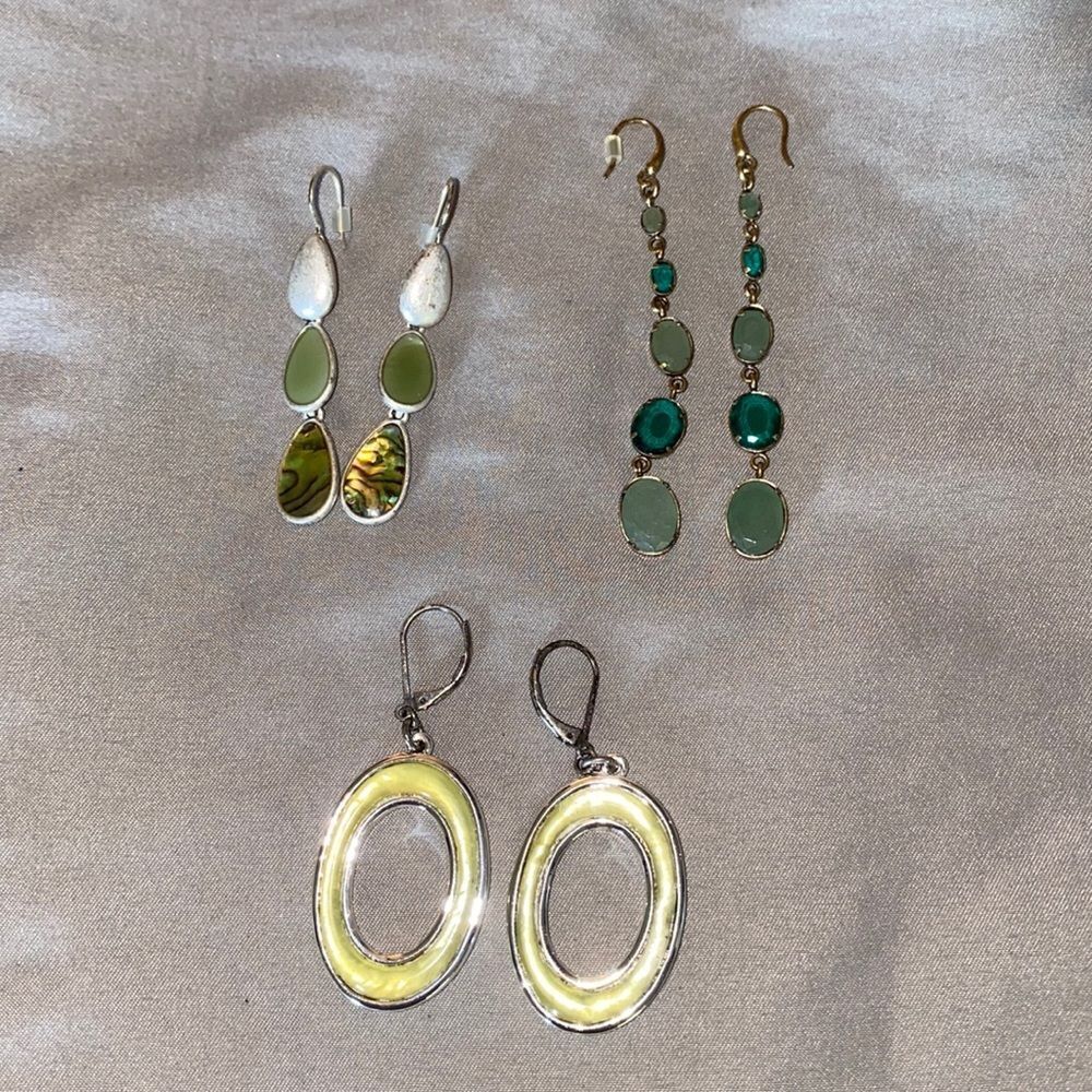 3 pairs of emerald earrings in various hues